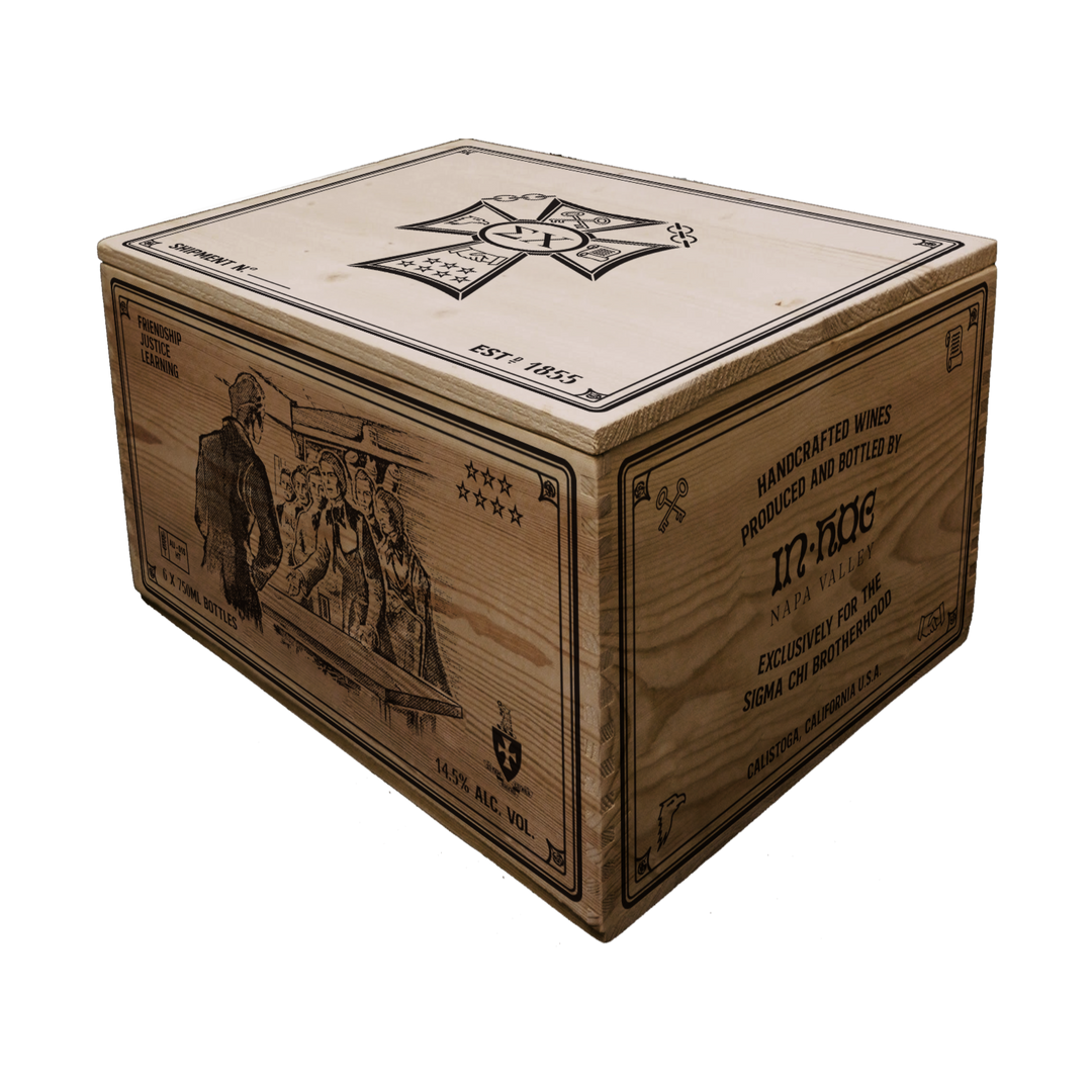 A vintage wooden wine crate with metal hinges and engravings.